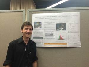 Evan Angelico and poster at ICHEP 2016